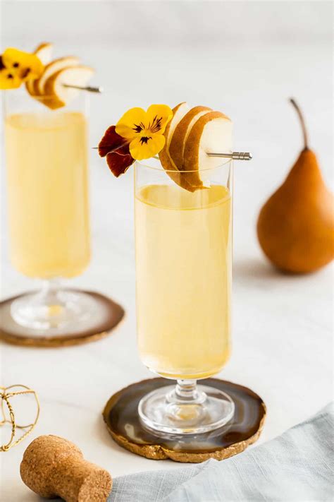 prosecco and pear juice cocktail with ginger liqueur celebrations at home