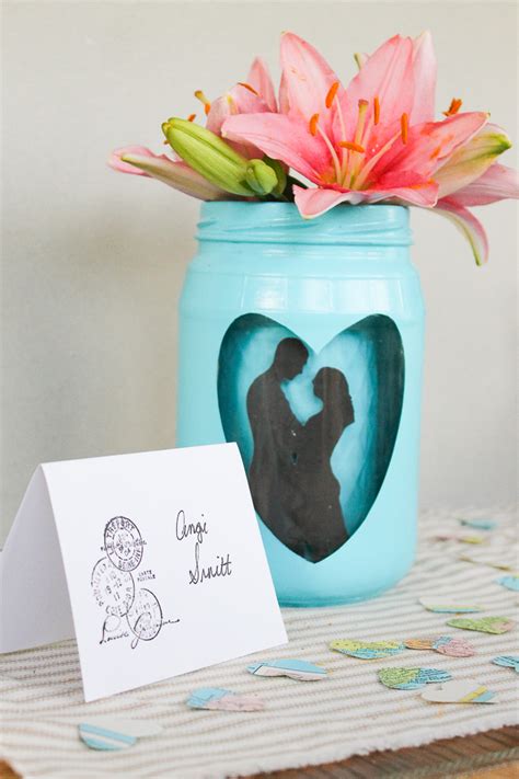 A flat sheet cake in the shape of a bit mason jar decorated in lots of piped frosting and happy congratulation messages for the bride to be is a perfect center for the main food table. DIY Bridal Shower Ideas with the Cricut - Hey, Let's Make ...