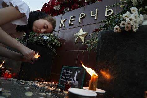 Crimean city turns to mourning 20 victims of school attack | AP News