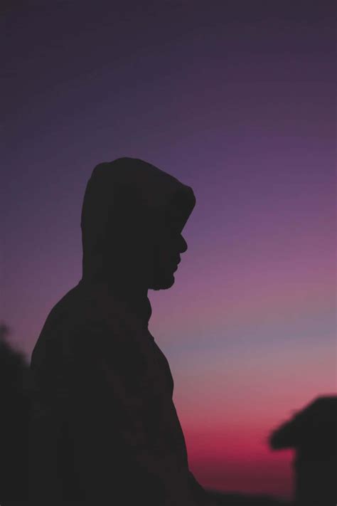Download Cool Sad Boy Sunset Silhouette Wallpaper