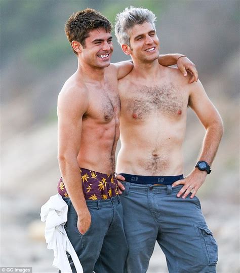Zac Efron Displays His Toned Physique As He Goes Shirtless Before