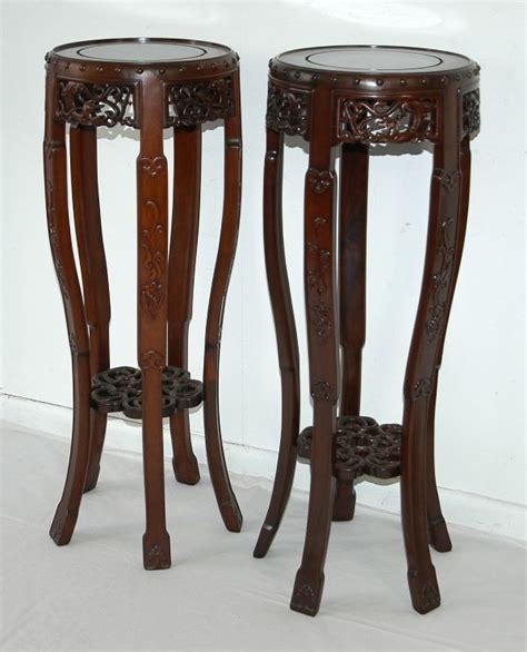 Follow this search, and we'll alert you as soon as more arrive. Pair Chinese rosewood plant stands. Ornately carved animal ...