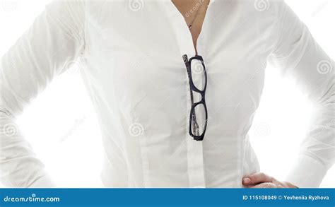 closeup image of eyeglasses hanging on decollete of white shirt stock image image of