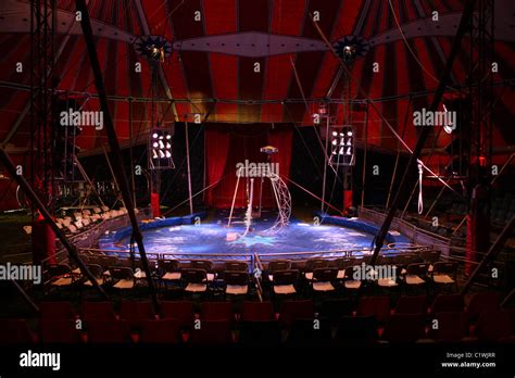 inside circus tent and a circus tent without a circus