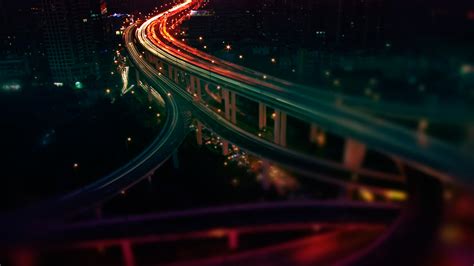 Time Lapse Photo Of Vehicle Passing Through Road During Nighttime