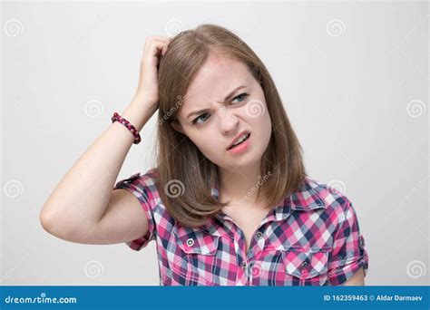 Young Caucasian Woman Girl With Questioning Puzzled Confused