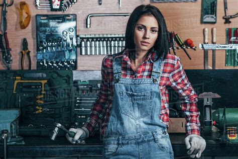 Portrait Of Female Mechanic Standing At Workshop Stock Photo Dissolve