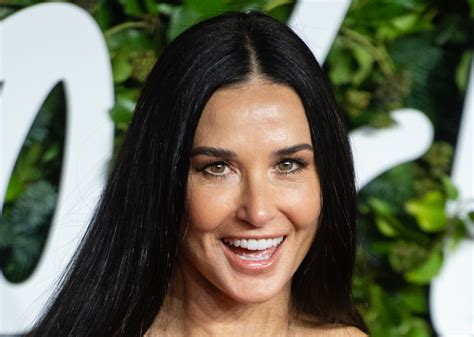 demi moore stuns in sunny selfie in front of the louvre museum trendradars