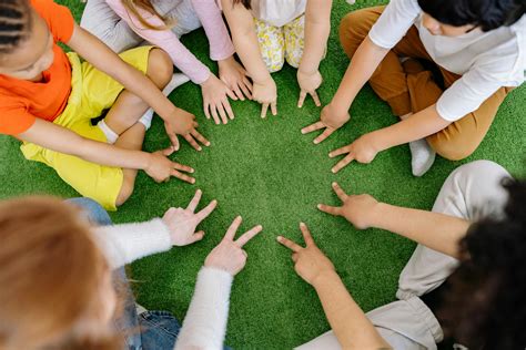 Group Of Children Playing On Green Grass · Free Stock Photo