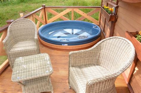 Hot tub on front balcony | Tiny house, Sunken hot tub, Tiny house interior