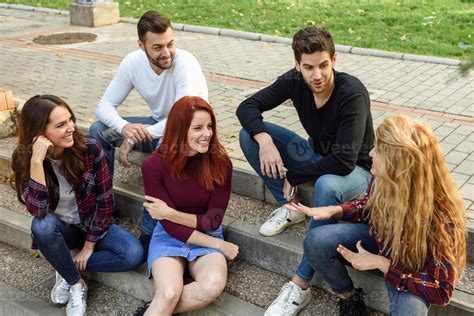 Group Of Young People Together Outdoors In Urban Background 4900234