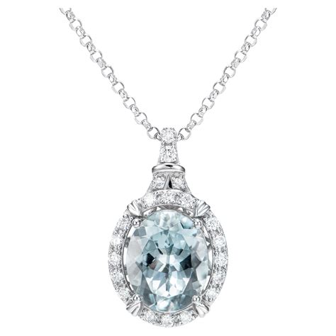 Aquamarine And Diamond Pendant Necklace In Platinum And Karat