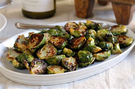 While making this roasted brussels spouts recipe with just olive oil, sea salt, and black pepper would make a tasty recipe, i like to add balsamic vinegar and raw honey to the brussels. Roasted Brussels Sprouts with Honey-Balsamic Glaze - Two ...