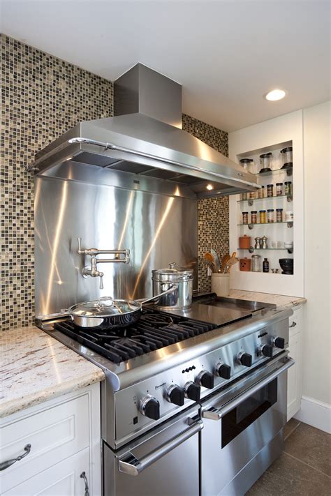 A Stainless Steel Stove And Range Provides A Contemporary Touch This
