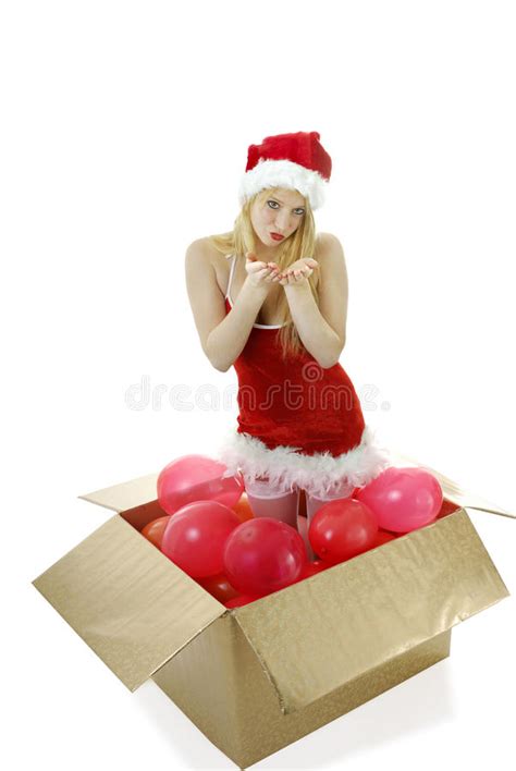 Jeune Fille Blonde De Santa Dans Des Baisers De Soufflement Dun Cadre Image Stock Image Du