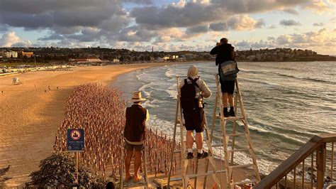 bondi briefly turned into a nude beach for photographer spencer tunick s latest mass