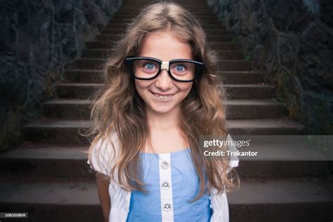 Young Girl In Nerdy Glasses High Res Stock Photo Getty Images