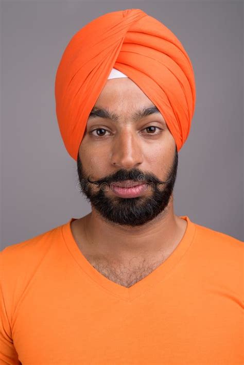 Indian Sikh Man Wearing Turban And Orange Shirt Stock Image Image Of