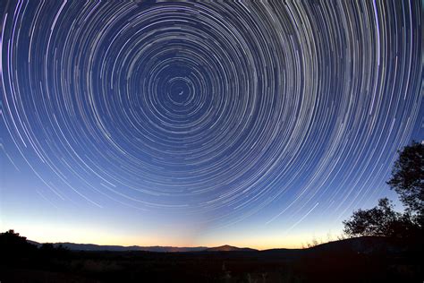 Star Trails In The Sky Above The Landscape Image Free Stock Photo