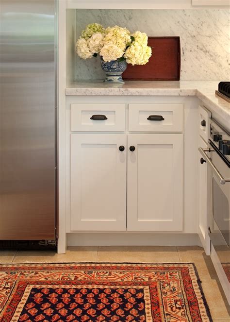 Bronze kitchen hardware with stainless appliances. Bronze Cabinet Hardware - Traditional - kitchen - Rustic ...