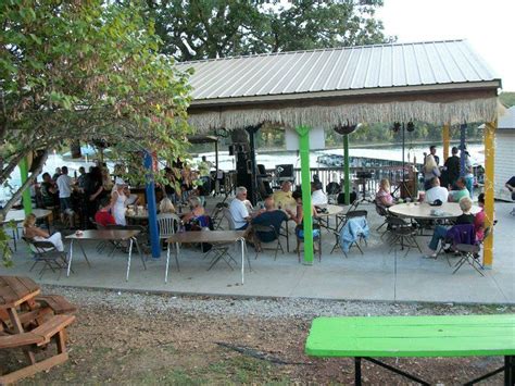 Ss dockside (at king's river marina) is a floating restaurant owned and operated by the now defunct (due to a fire) coyote's formerly at kimberling city. Tiki Bar at Table Rock Lake (With images) | Lake resort ...