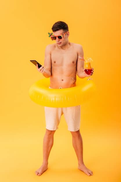 Free Photo Full Length Image Of Confused Naked Man In Shorts And Sunglasses