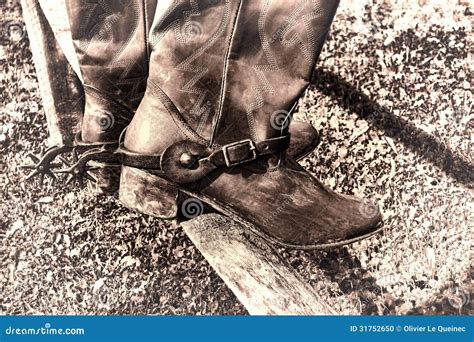 American West Rodeo Vintage Cowboy Boots On Fence Stock Photo Image