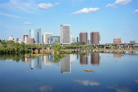 Richmond Virginia Skyline Reflecting In The James River Photograph By