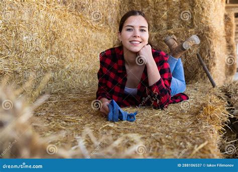 Cheerful Young Woman Farm Worker Lying On Hayloft Stock Image Image