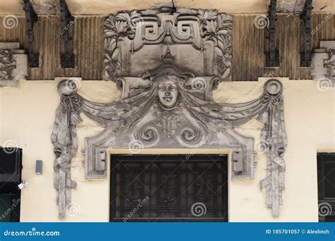 An Architectural Ornament Relief Above The Building Entrance Door And