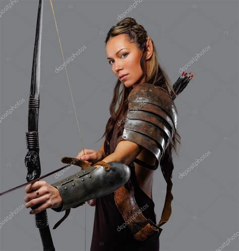 Warrior Woman Holds Bow Stock Photo By ©fxquadro 105441350