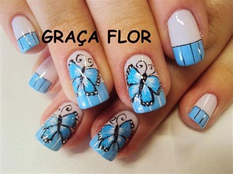 Maybe you would like to learn more about one of these? butterfly blue striped french nails - Favnails