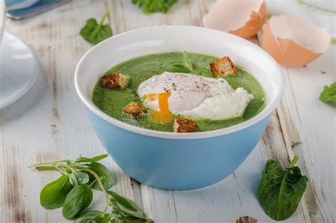 Eating it makes you happy and it only takes 3 minutes! Egg Trio Soup With Spinach : Spinach Soup With Poached Egg Stock Photo - Image of lunch ...