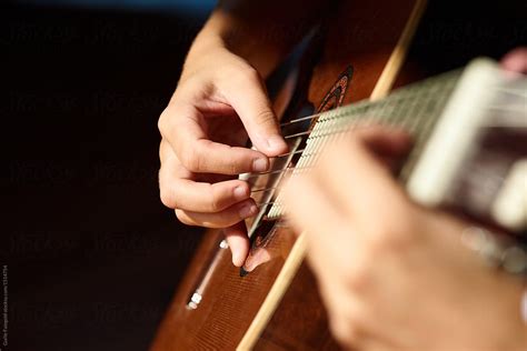 Close Up Person Playing Guitar By Stocksy Contributor Guille