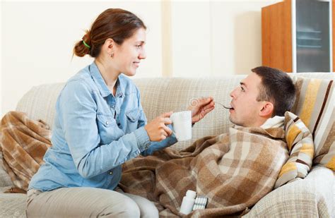 Woman Caring For Sick Man Stock Image Image Of Influenza 43948971