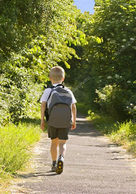 Young Boy Wearing A Backpack — Stock Photo © Speedo101 3044256