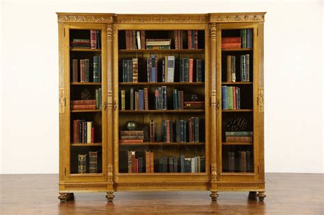 Item features solid wood construction, beautiful oakwood grain, nicely carved details. Triple 1890's Antique Carved Oak Library Bookcase, Wavy ...