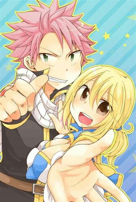 Two Anime Characters With Pink Hair And Blonde Hair One Holding The