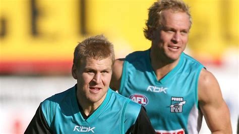Chad cornes flies high over brother kane in a match against collingwood earlier this year. Chad and Kane Cornes about to join elite band of brothers ...