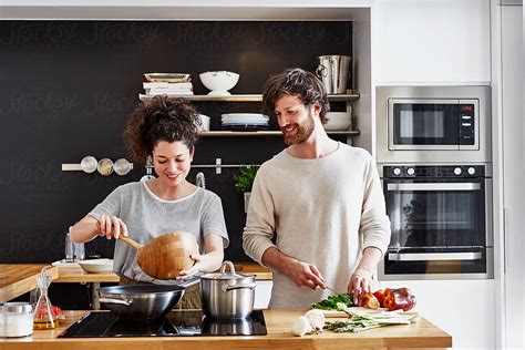 Couple Cooking Together In Kitchen By Stocksy Contributor Alto Images Stocksy