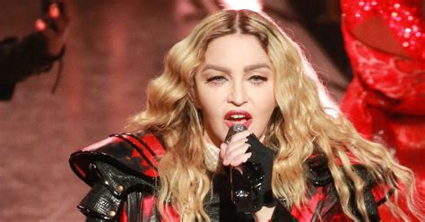 madonna pulls down 17 year old fan s top during brisbane concert huffpost entertainment