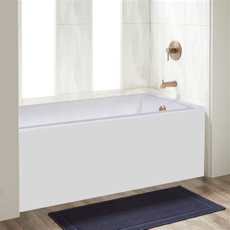 A soaking tub with an alcove installation is 18 inches deep and has a convenient integrated overflow drain for extra safety. 60" x 30" Drop in Soaking Bathtub | Joss & Main