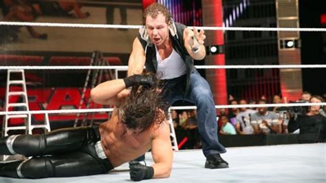 Wwe Dean Ambrose Seth Rollins Make Wwe Money In The Bank Briefcase