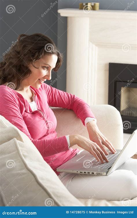 Woman Using Laptop Relaxing Sitting On Sofa Stock Image Image Of