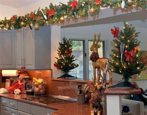 My excitement started with christmas garland that i bought last year. Brilliant Christmas Garland Decorating Ideas | Christmas kitchen, Decorating above kitchen ...