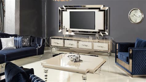 There is a dining area and a kitchen. Menfora Luxury TV Unit | Luxury Line