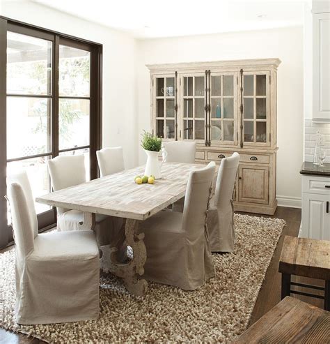 French Country Style Dining Room With A Stylish Hutch And Dining Table