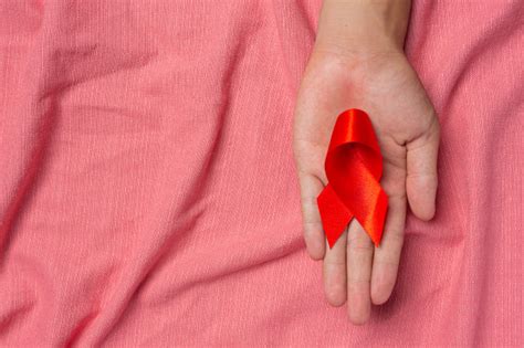 Free Photo Woman Hand Holding Red Ribbon Hiv Awareness Concept World Aids Day And World Sexual