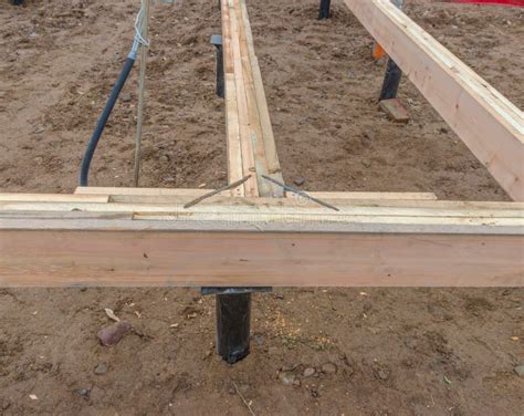 On The Basis Of The Pile Foundation Timber Framing House Stock Photo