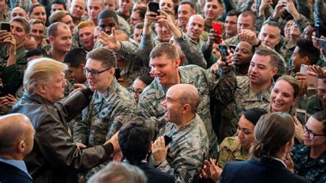 How Trump Measures Up On Visiting Troops